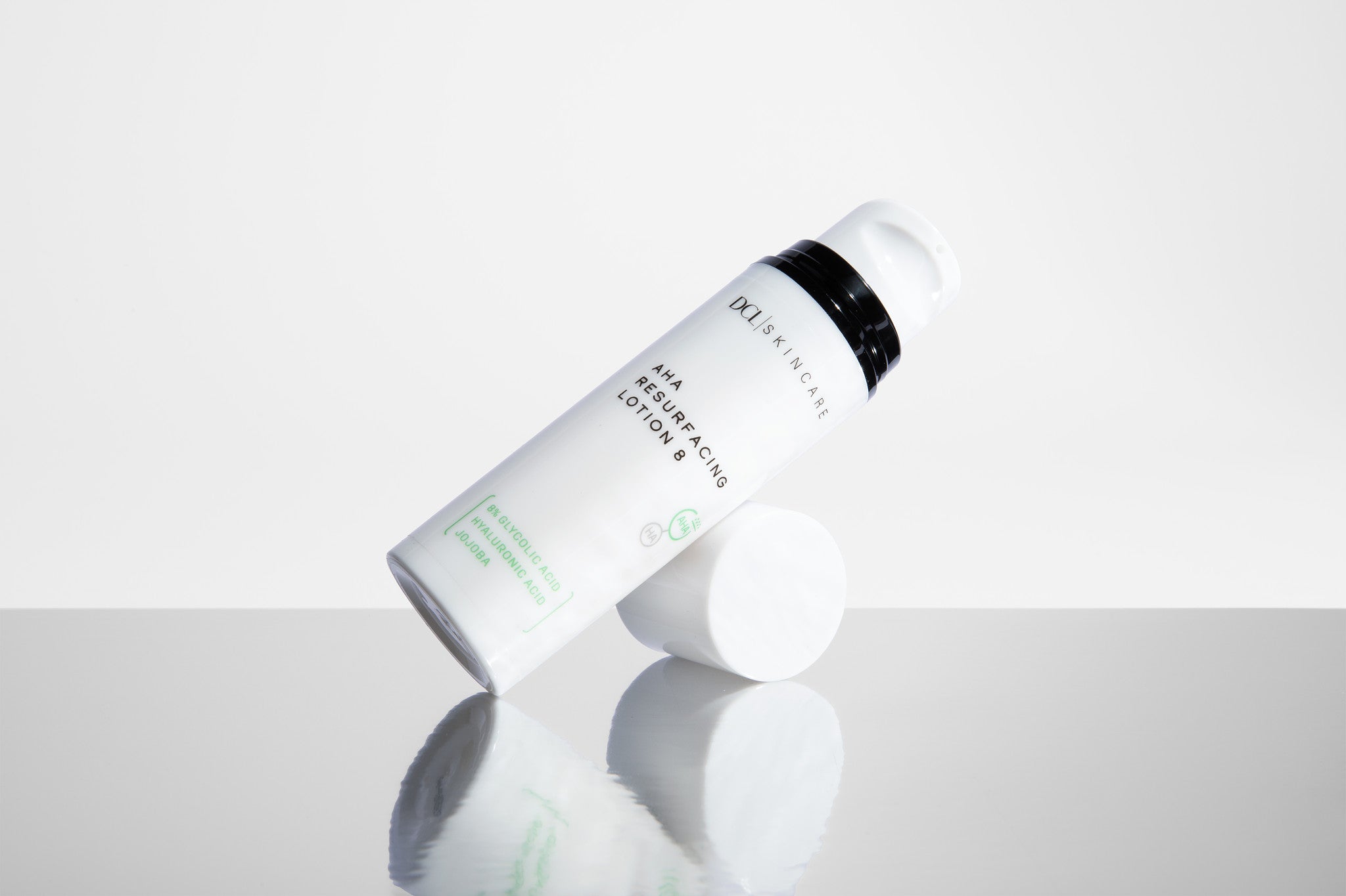 AHA Resurfacing lotion tilted with reflection