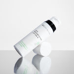 AHA Resurfacing lotion tilted with reflection