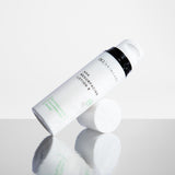 AHA Resurfacing lotion tilted with reflection